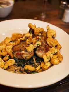 Pan Roasted Chicken with Chanterelles, Spaetzle, Beet Greens, and Riesling Jus at Balthazar in New York. #roastchicken #wishlist