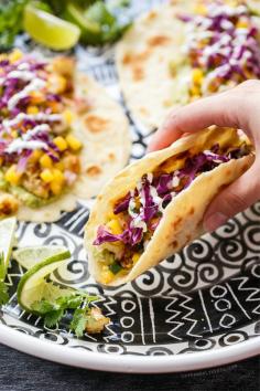 Crispy Cauliflower Tacos with Mango Salsa from www.loveandoliveo...