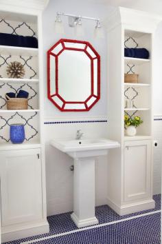 This is a great bathroom.  Love the navy blue penny tile flooring.