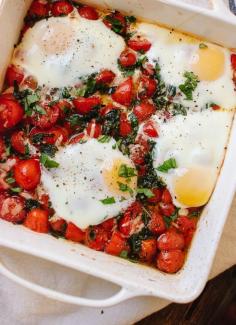 Baked eggs on roasted cherry tomatoes