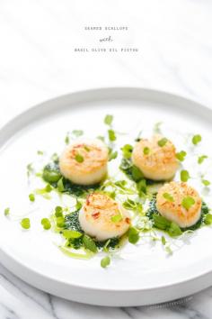Seared scallops with basil olive oil is one of our absolute favorites--you NEED to try this recipe.