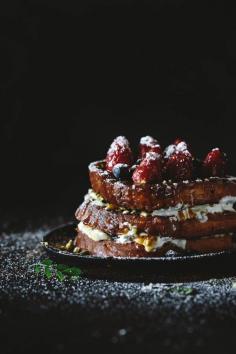 brioche french toast with berries and caramel sauce