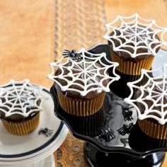 
                        
                            Super-easy white-chocolate toppers appear to float, Houdini-like, over chocolate cupcakes.
                        
                    