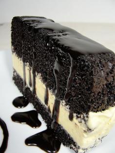 perfect ice cream cake...moist rich chocolate cake, vanilla ice cream, chocolate cookie crust, and chocolate drizzle