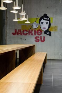 German design studio RAUMINRAUM designed the interior of the Jackie Su Thai restaurant in Bremen, Germany.