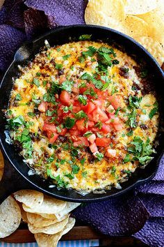 Queso Fundido. One of my very favorite party foods to feed a crowd. Serve with a bowl of chips and it'll disappear!