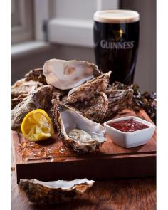 The British Isles  Classic combination: fresh oysters and a pint of Guinness stout. Credit: ANDREW WATSON: LONELY PLANET IMAGES