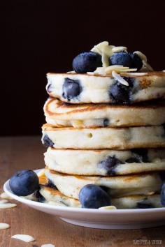 
                        
                            Extra Fluffy Blueberry Almond Pancakes- greek yogurt makes these pancakes so thick and fluffy!
                        
                    