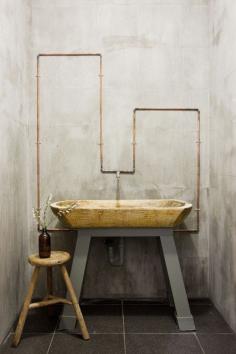 
                        
                            wooden vanity polished concrete exposed copper pipes bathroom sink.  I find this look very zen, I think that it is a stunning detail and so calming. i can imagine being in this room
                        
                    