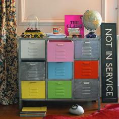 Great upcycle idea / Colorful painted file drawers interspersed with grey drawers in a grey file cabinet / Table Tonic