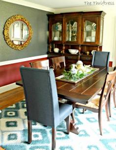 Love the mirror and gorgeous rug in this dining room update.