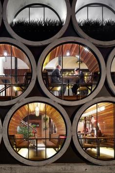 
                    
                        hotel | "prahran" | australia | by techne architects | idea : extension that uses 17 ½ concrete waterpipes
                    
                