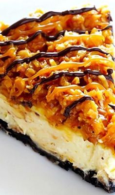 
                    
                        Samoa Cheesecake Recipe ~ inspired by the famous Girl Scout cookies (a.k.a. "Caramel DeLites"). It's a simple vanilla cheesecake base, made with an Oreo crust, and topped with caramel, toasted coconut and drizzled with chocolate... Fabulous!
                    
                