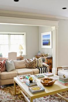 
                    
                        Soft and neutral family room with DIY Greek key leg coffee table.
                    
                