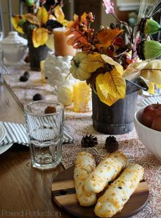 
                    
                        Golden Autumn Tablescape with rustic fall bucket arrangements
                    
                