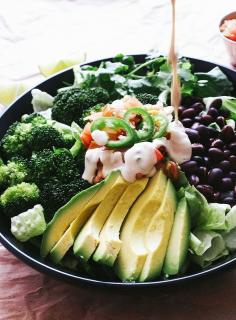 
                    
                        Black bean broccoli avocado salad + cumin lime tahini dressing / Recipe
                    
                