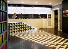 
                    
                        AAmp Studio designed a new concept store in Los Angeles for a chocolate company with a graphic, black and white concept where the chocolate takes the stage.
                    
                