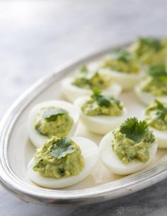 
                    
                        Guacamole deviled eggs, a perfect game-day appetizer! Hard boiled eggs stuffed with guacamole—avocado, lime, chiles, sour cream. Healthy and addictive. On SimplyRecipes.com
                    
                