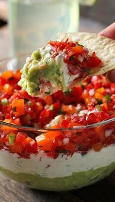 
                    
                        Triple Layer Guacamole Creamy Cotija and Confetti Salsa Party Dip.
                    
                