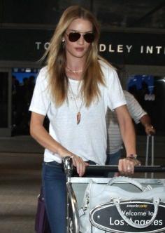 
                    
                        Rosie Huntington-Whiteley Arriving On A Flight At LAX
                    
                