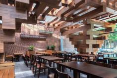 
                    
                        Stacks of timber create an open light-filled space for this restaurant
                    
                