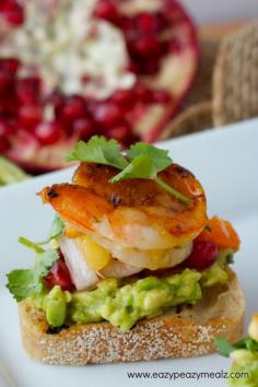 
                    
                        Grilled Shrimp Crostini: Ridiculous flavor, creamy guac, succulent shrimp, tropical salsa, all comes together in this quick and easy appetizer sure to please! #ad - Eazy Peazy Mealz
                    
                
