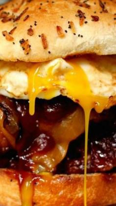 
                    
                        Grilled Barbecue Bacon Meatloaf Sandwich ~ A thick slice of grilled, bacon wrapped meatloaf covered in a melty slice of sharp cheddar cheese, topped with bourbon caramelized onions, more barbecue sauce and a fried egg.  T
                    
                