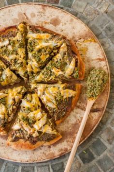 
                    
                        Avocado Pesto and Chicken Mexican Pizza by www.platingpixels... - Walnut and avocado pesto pairs wonderfully with beans and chicken. This is basically a burrito on a pesto pizza!
                    
                