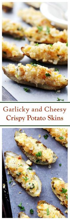 
                    
                        Garlicky and Cheesy Crispy Potato Skins topped with three cheeses, sour cream, garlic croutons and green onions. | #appetizers
                    
                