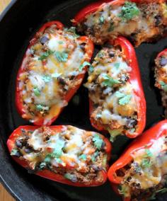 Black bean, sweet potato and quinoa stuffed red peppers