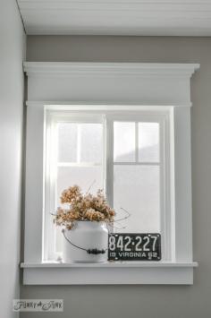 Make a farmhouse window - add window trim to beef up a plain window with no miter cuts. funky junk interiors