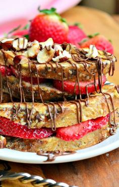 
                    
                        Fruit Filled Hazelnut French Toast. Delightful whole grain French Toast filled with fruit, soaked in hazelnut flavored egg mixture and topped with toasted hazelnuts and some hazelnut cocoa spread.  from willcookforsmiles...
                    
                