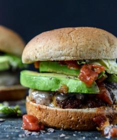 Taco Burgers with crushed tortilla chips and avocado