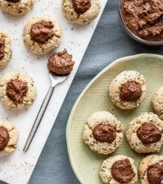 
                    
                        Spiced Almond Thumbprint Cookies with Chocolate-Cashew Cardamom Frosting
                    
                