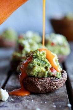 Blue Cheese Guacamole Stuffed Mushrooms with Buffalo Sauce via Half Baked Harvest #lowcarb #appetizer. Check out my posts on FB for more great recipes http://facebook.com/sally.whipple.7