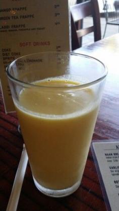 
                    
                        Lassi Frappe - so yummy.  Mango, banana, pineapple and yogurt.  From World Curry.  Ever so delicious!
                    
                