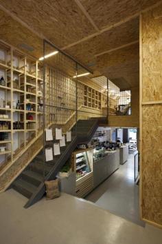 
                    
                        A Cafe Designed To Look Like The Inside Of A Packaging Crate
                    
                