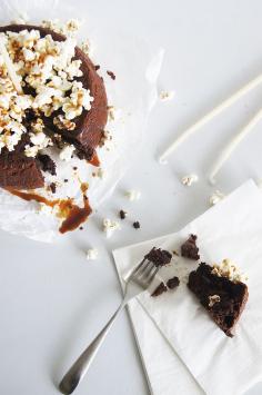 
                    
                        flourless chocOlate cake with popcorn & caramel sauce
                    
                