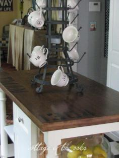 antiqued / distressed kitchen island how-to I like the cup holder