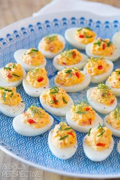 
                    
                        Easy and addictive Pimento Cheese Deviled Eggs! Bold and zesty with a rich pimento cheese recipe for the filling, made with the hard boiled egg yolks, then
                    
                