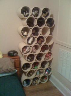 PVC pipe shoe storage... you could use old paint cans, too. - bottom of closet - We were just looking for some shoe storage ideas today!