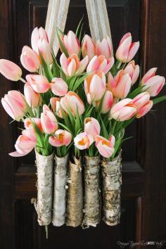 
                    
                        This is STUNNING!  Learn to create a DIY tulip wreath with this full tutorial.  It is easy and only takes 10 minutes!
                    
                