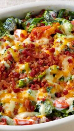 
                    
                        Creamy Broccoli-Bacon Bake Recipe ~ Broccoli and carrots get tossed in a creamy sauce with hints of green onion and garlic. Then, shredded cheese and smoky bacon top and elevate this already amazing baked side to something special.
                    
                