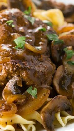 
                    
                        Salisbury Steak ~ with mushrooms and onions served with gravy over noodles or rice... comfort food at its finest!
                    
                