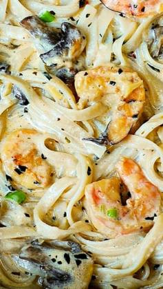 
                    
                        Creamy Shrimp and Mushroom Pasta in a Delicious Homemade Alfredo Sauce ~ This creamy alfredo sauce has all the flavors you want and need... shrimp flavor, garlic, basil, crushed red pepper flakes, paprika, Parmesan and Mozzarella cheese.
                    
                