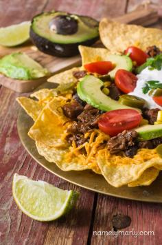 
                    
                        Vegan Loaded Nachos - try these flavorful and easy vegan nachos any night (or day) of the week!
                    
                