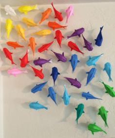 Wall of Rainbow Origami Koi - DIY Wall hanging. This is so wicked.