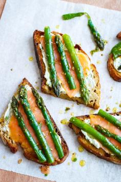 
                    
                        Perfect for a spring party or a Sunday brunch, these pretty asparagus and smoked salmon toasts make for an easy appetizer everyone will keep coming back to over and over again.
                    
                