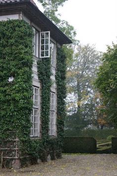 
                    
                        Vine covered home, looks like it could be french...thought of you Melissa, you mentioned wanting ivy on your home :)
                    
                