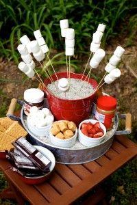 Outdoor S'Mores Bar...add old school fun to graduation parties, 4th of July picnics, summer parties  #party #PartyTricks #PartyTime #Celebrate #DIY #Smores #Bar #SmoresBar #SmoresBuffet